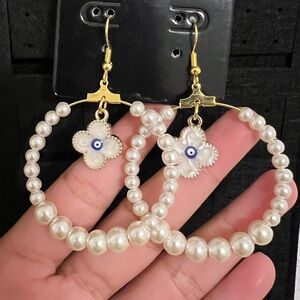 Pearl evil eye earrings